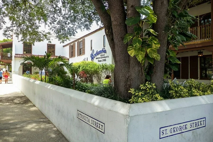Columbia Restaurant exterior on St. George Street, St. Augustine — Since 1905 painted on the white building