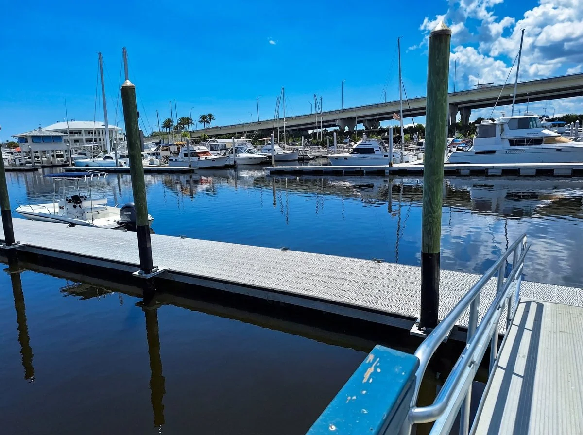 Dockside Seafood Restaurant dock with marina and bridge in background